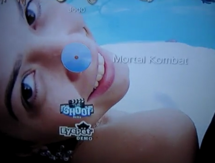 The game inside the PS3 with family pic in the background